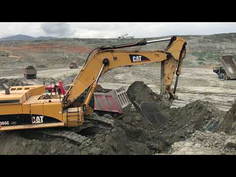 Caterpillar 365C Excavator Loading Trucks
