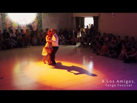  Michalis Souvleris  and  Maria Kalogera  are  dancing  to  "  Mi Vieja Linda  "  by  Emilio Pellejero  at  A los amigos tango festival  in  2015