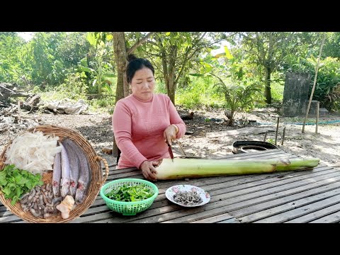 Cooking banana's tree sour soup with fish, shrimp and holy basil-Fresh vegetables.Nice cooking show