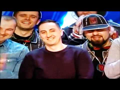 America's Got Talent gold buzzer winner Light Balance. Host Tyra Banks hits the gold buzzer!