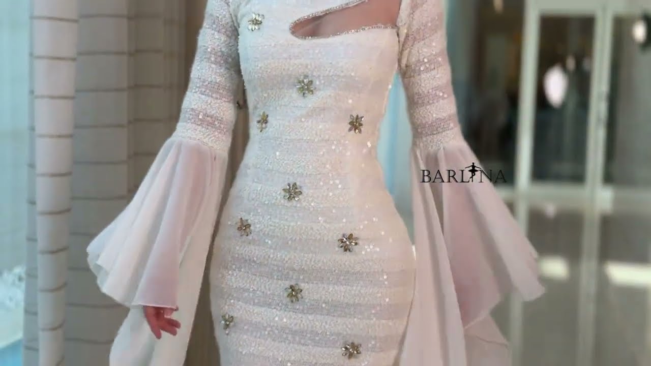 A dress decorated with sequins and crystal roses - XXL
