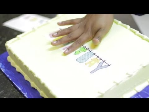 Part of a video titled How to Transfer Images in Cake Decorating - YouTube