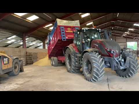 Valtra tractor tips the last load just in time
