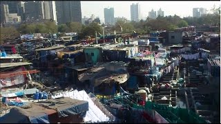 preview picture of video 'South Mumbai's Attraction - Dhobi Ghat, A Biggest Open Laundromat at Mahalaxmi'