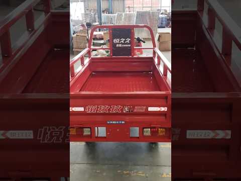 Introducing the Red Four-Wheeled Iron Tricycle – a perfect blend of durability and style!