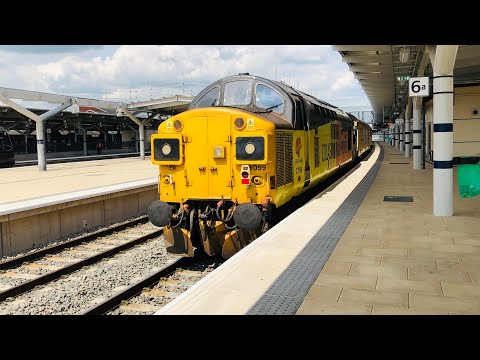 Colas rail class 37 nos 37099 departs derby for derby R.T.C. afer working form March with test train