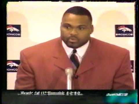 Neil Smith signs with Denver