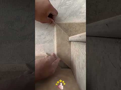 The connection process of baseboards at the stair position