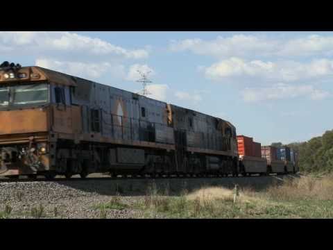 Two Pacific National "NR class" locomotives climb towards Gheringhap
