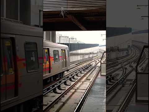 Metro de Santiago Línea 4A (AS02) ingresando a Estación La Cisterna