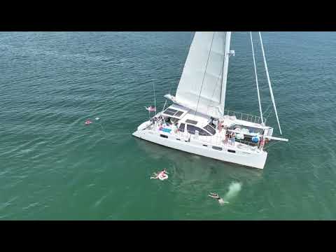 Bachelorette yacht Party Booze Cruise aboard Valkyrie Sailing Catamaran. Swimming and jumping from charter boat