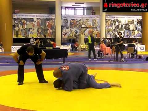 Mixalis Pavlis VS Dimitris Tsitos - grappling 2011.avi