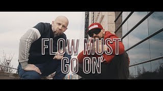 Kadr z teledysku Flow Must Go On tekst piosenki Peja/Slums Attack feat. DGE