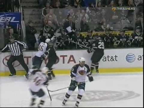 Andrew Ladd flattens Stephane Robidas