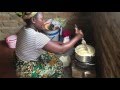Farmer´s wife preparing Zambia´s typical maize meal: nshima