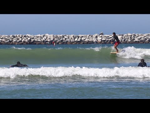 Atraccións e surf na praia estatal de Doheny