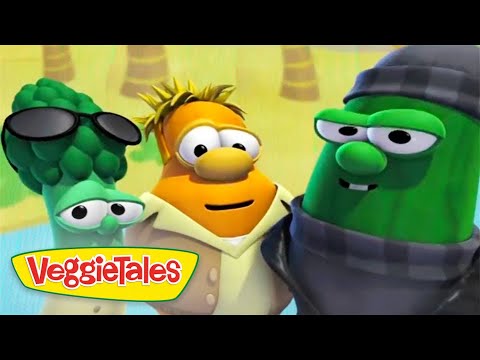 Three VeggieTales characters pose together, a carrot center, a sunglasses-wearing broccoli left, and a green cucumber in a hat and scarf on the right, with VeggieTales logo visible.