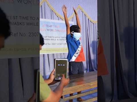 Fastest time to apply 10 surgical masks blindfolded - 11.56 seconds by Josukutty Ebin 🇮🇳