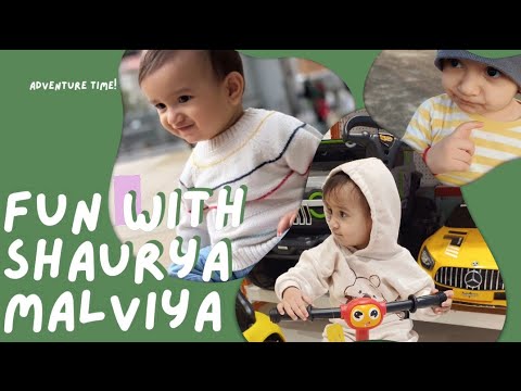 He is playing with his favourite dog puppy!!#shaurya