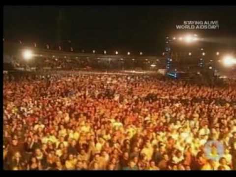 Queen & Anastacia - 'We Will Rock You' (Live In South Africa 2005)