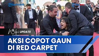 Sosok Aktivis Wanita Pro-Ukraina Lakukan Aksi Copot Busana di Karpet Merah Festival Film Cannes