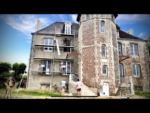 Removing The Scaffolding To REVEAL  The RESTORED chateau Facade.