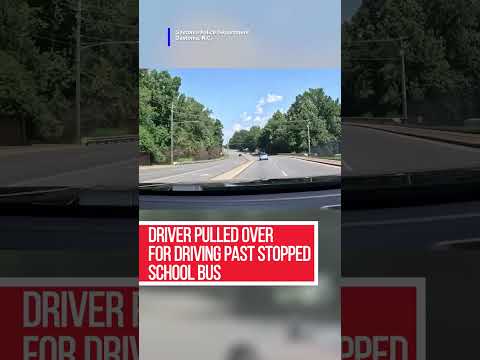 Driver blows by a stopped school bus while a police officer is behind it