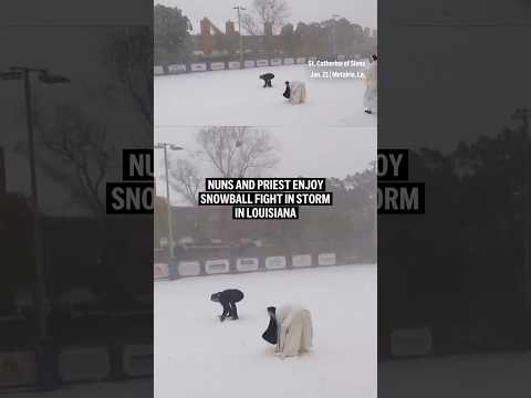 Nuns and priest enjoy snowball fight in storm in Louisiana