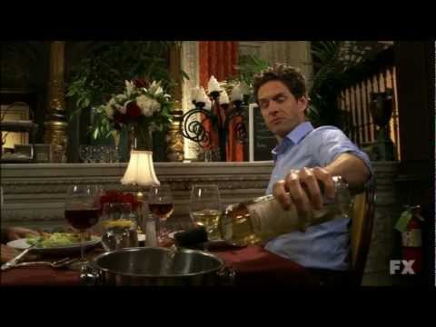 Charlie and Mac staring at each other from across the room