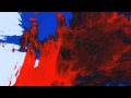 slow motion red and blue on white paint splatter ...