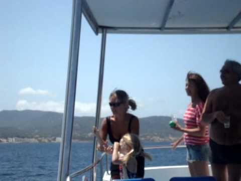MY DAUGHTER FEEDING THE SEAGULLS IN IBIZA.
