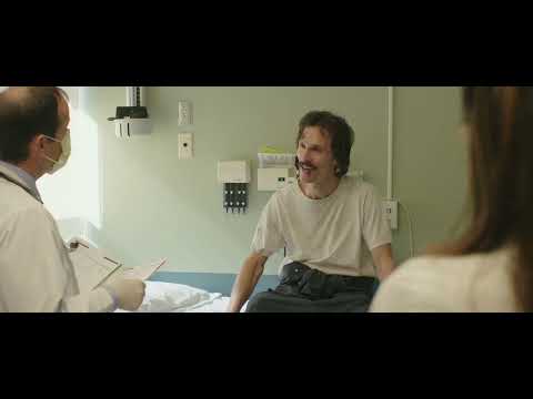 Trailer still: Ron and Rayon in a car, needle-drop intimacy and road noise