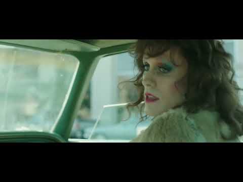 Dallas Buyers Club official trailer still: Ron Woodroof driving through sun-faded Dallas