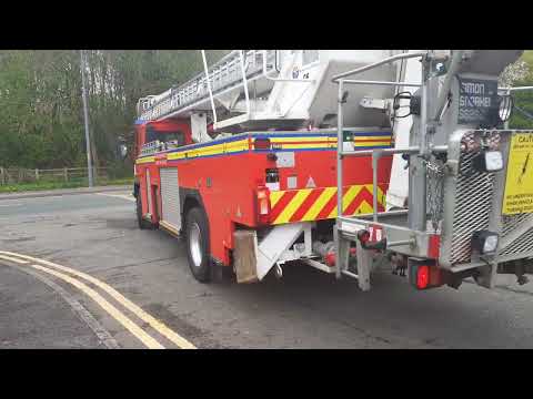 Greater Manchester Fire & Rescue Service, G57A1 (Leigh) hydraulic platform, blue light & sirens.