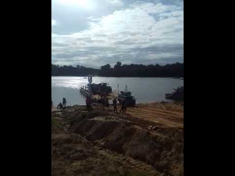Boarding a pontoon @ Kurupukari Crossing on the Essequibo River in the heart of the Guyana rainfores
