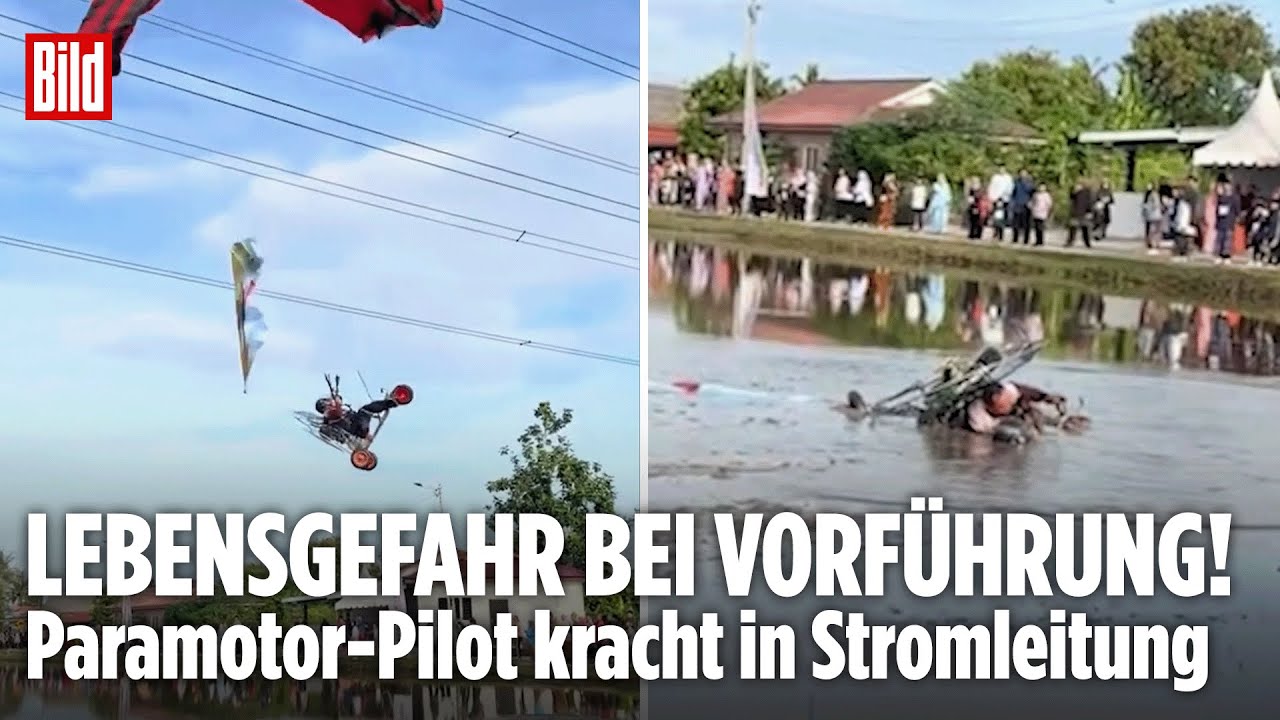 DRAMATISCHER UNFALL: Paramotor-Pilot kracht in Stromleitung – Dann stürzt er ins Reisfeld