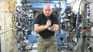 Scott Kelly does a space flip for CBS News