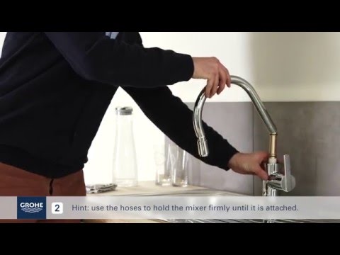Install a GROHE single lever kitchen mixer with pullout mixer spout