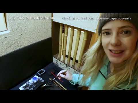 19 Checking out traditional Japanese paper souvenirs