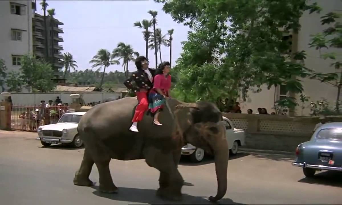 Lambuji Lambuji Bolo Tinguji Lyrics  | Coolie | Amitabh Bachchan, Waheeda Rehman | Shabbir Kumar, Shailendra Singh | Laxmikant Shantaram Kudalkar (Laxmikant Pyarelal), Pyarelal Ramprasad Sharma (Laxmikant Pyarelal)