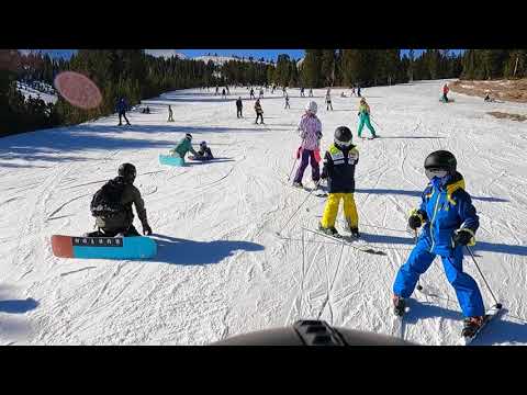 First day on Mammoth, group warming up. Green run.