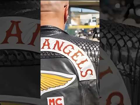 Mongols Boss spots a Hells Angel behind him