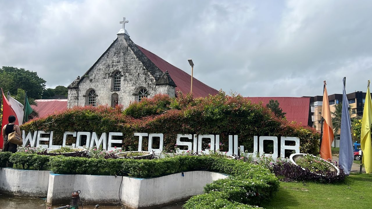 Join a tourist on a walking tour of the divine St Francis Church Siquijor