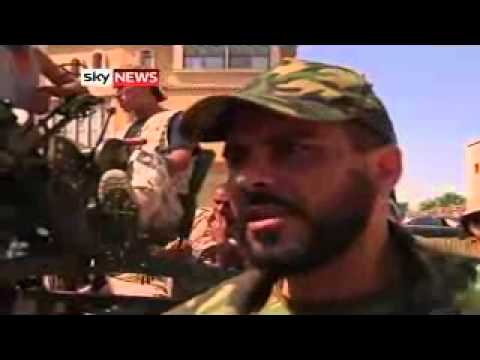 Libya Conflict: Rebels Fight For Control Of Tripoli
