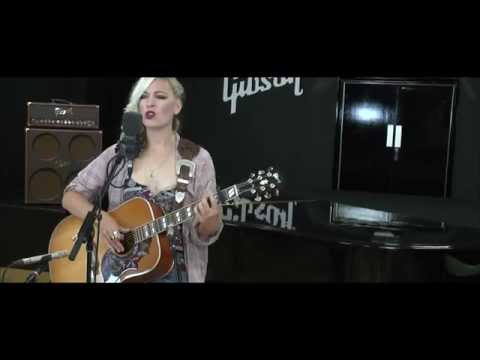 Amy plays White Lies at Gibson UK HQ