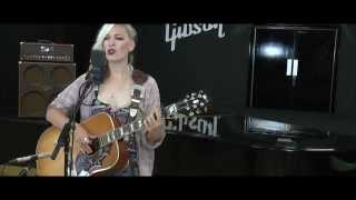 Amy plays White Lies at Gibson UK HQ