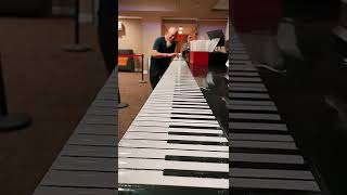 fastest piano player playing the longest piano in 