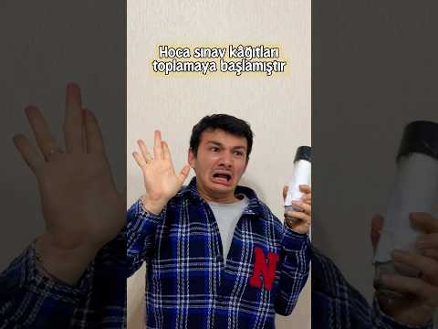 Hoca sınav kâğıtları toplamaya başlamıştır