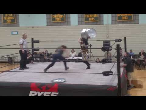 Garbage can goes flying as Laura Loveless spears Honey Badger!