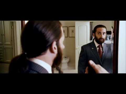Trailer still: Evan Baxter in robes, cutting between Capitol Hill and ark yard